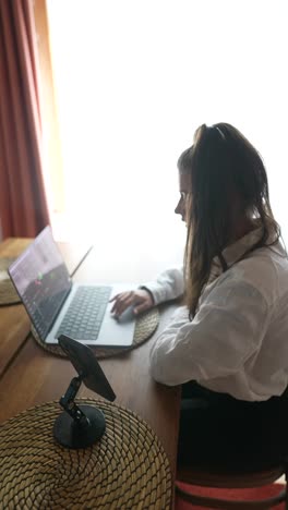 woman working from home on a laptop