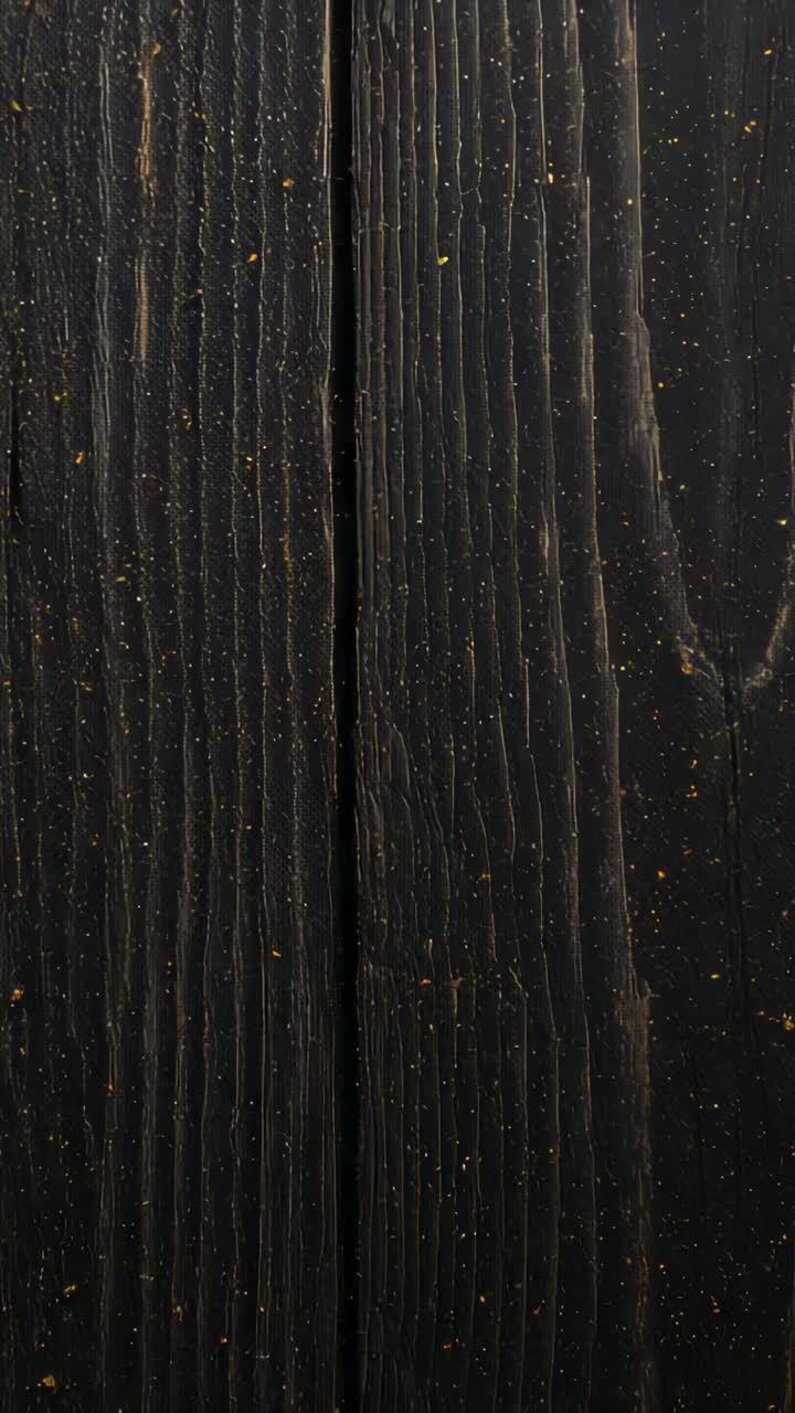 Vertical video: Camera recording wooden planks closeup for inspection, showing seam, grain, flecks