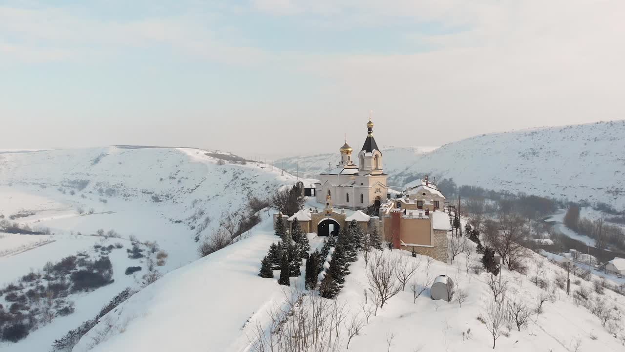 Winter Church on a Snowy Hill