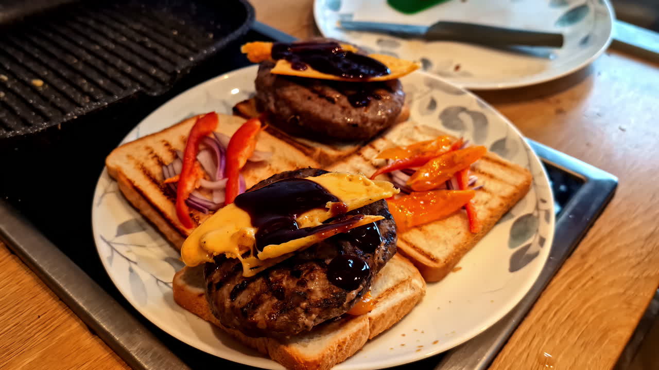 Homemade Grilled Beef Burgers with Cheese and BBQ Sauce