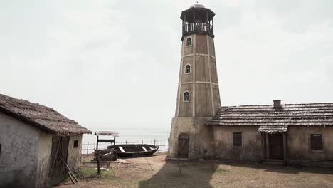 abandoned seaside village with lighthouse