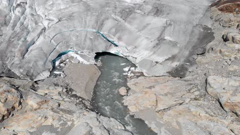 Aerial:-glacier-melting-and-receding,-global-warming-melting-ice-sheet