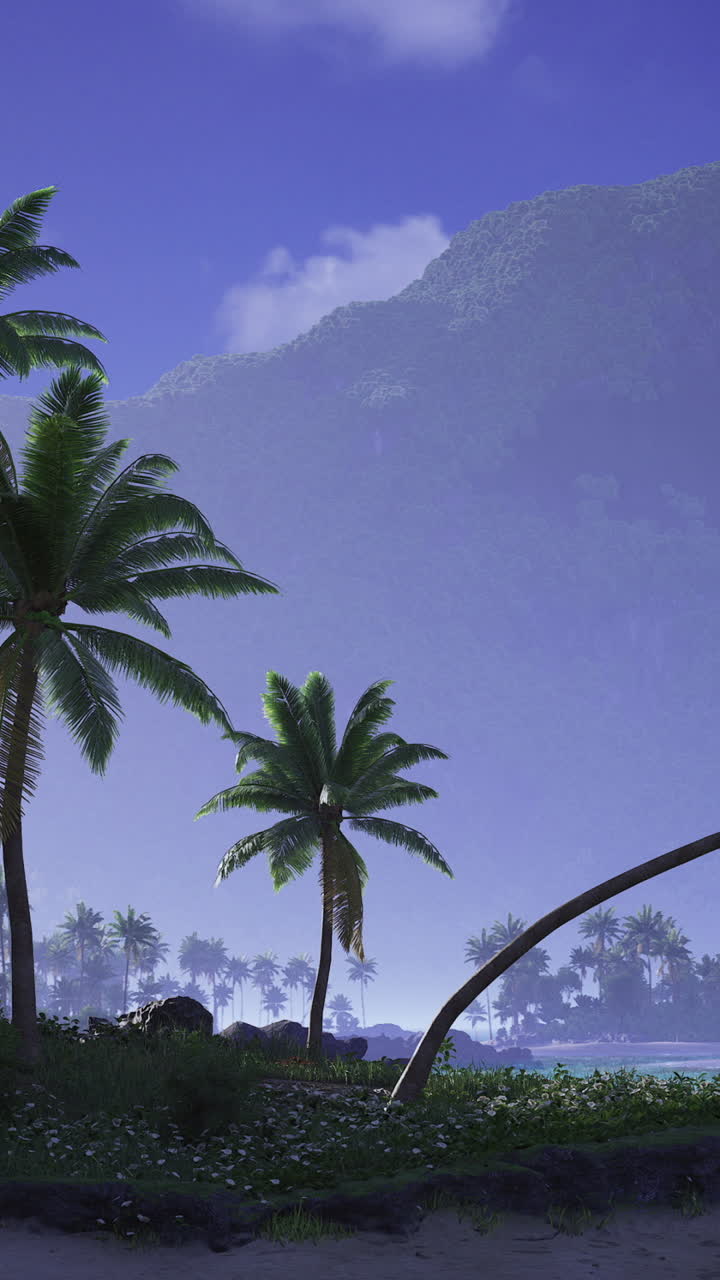 Tropical landscape with palm trees and distant mountains under blue sky