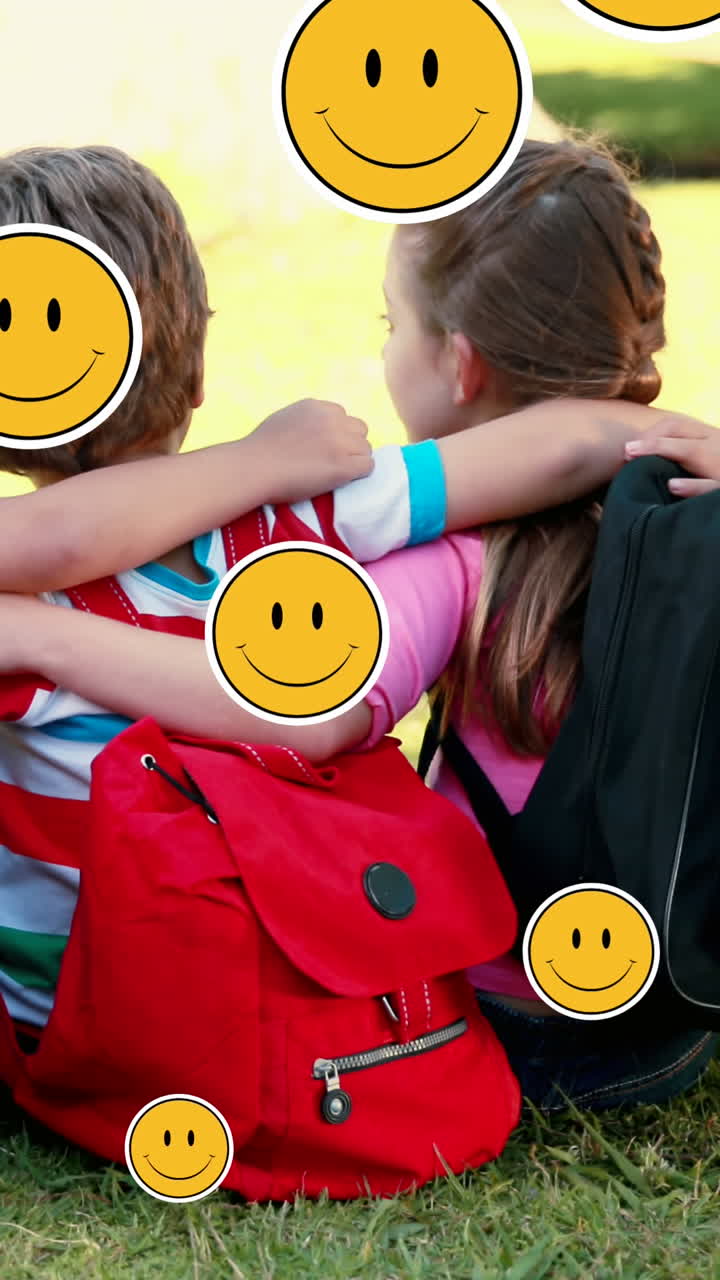 Animation of falling love emoji over diverse school children