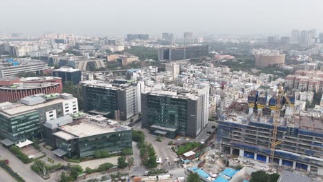 Visual contrast between industrial and residential zones in Hyderabad