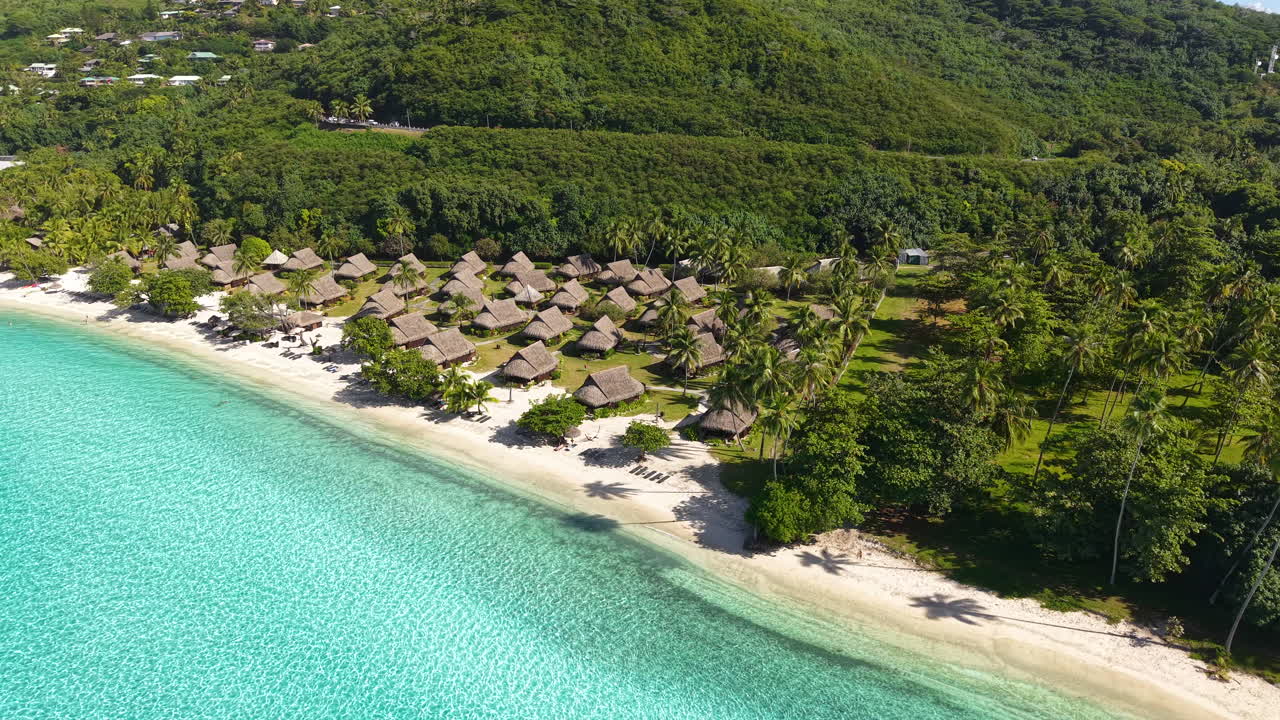 French Polynesia, Moorea Island, Aerial View of Beachfront Villas, White Sand, Turquoise Water and Green Tropical Landscape