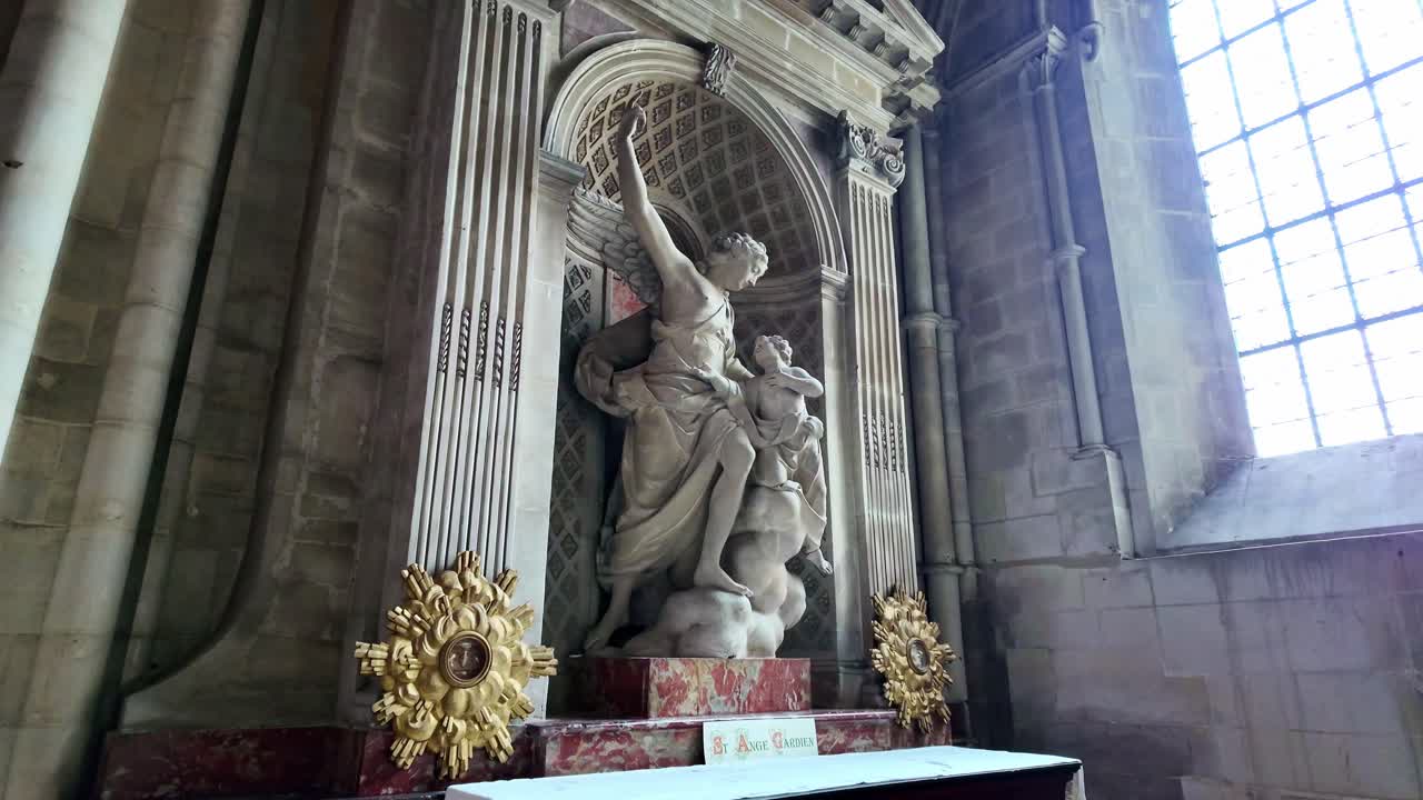 Close-up view about the representation of the statue above the altar in L'Abbaye-aux-Hommes, Caen, France.