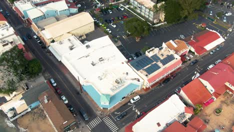 Lahaina-township-coast-and-street-traffic-in-Hawaii,-aerial-cinematic-view