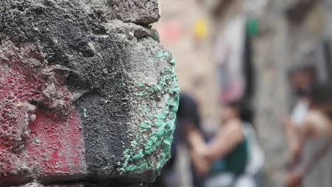 graffiti-covered urban wall with blurred background