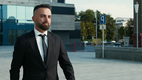 businessman in front of modern buildings