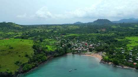flying towards morro peixe village (fishing village) and beach in são tomé e principe,africa