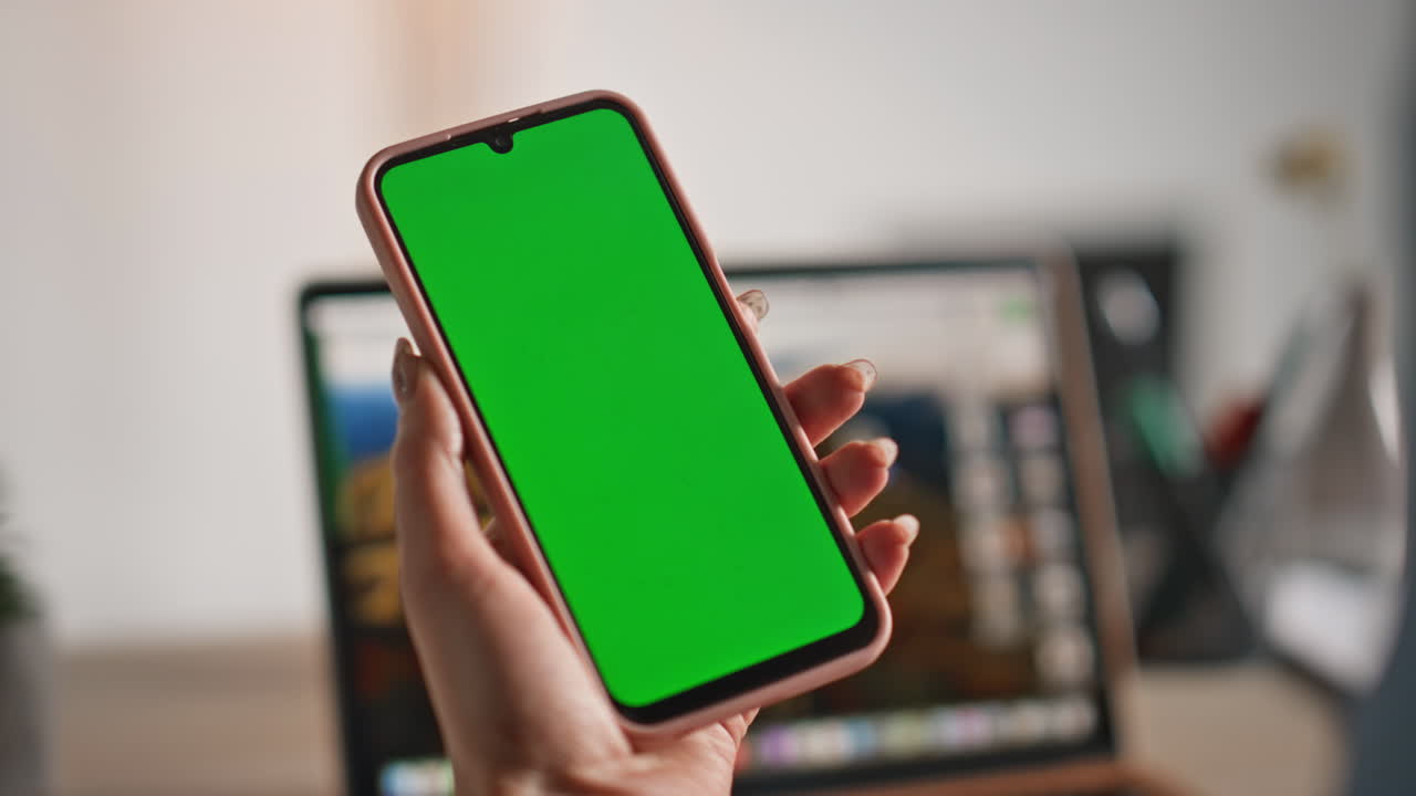 Girl fingers zooming mockup smartphone watching social media at home closeup