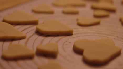 heart-shaped cookies on a baking sheet