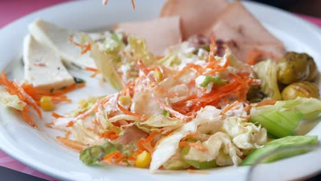 mixed salad with cheese and ham