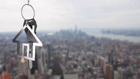 house-shaped keychain animation over blurred cityscape background