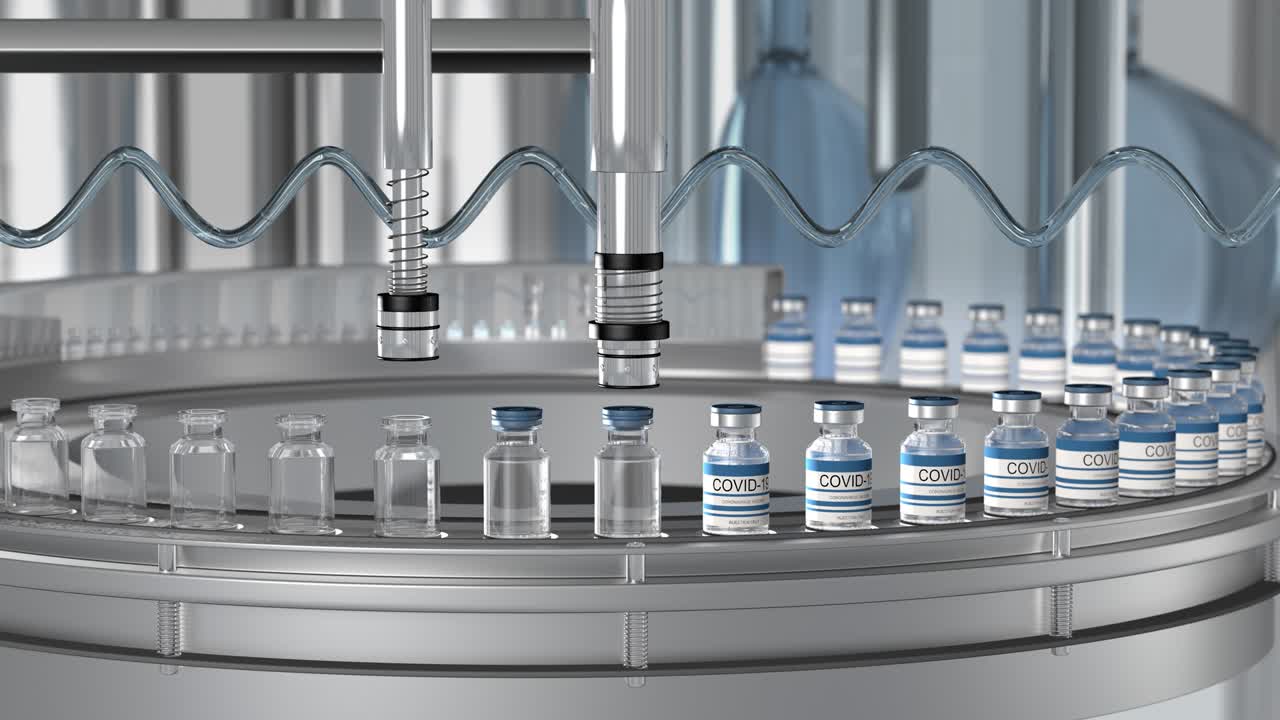 SARS-COV-2 COVID-19 Mass production of coronavirus vaccine, a machine pours the vaccine, seals bottle caps into ampoules moving along a pharmaceutical conveyor belt in a research laboratory