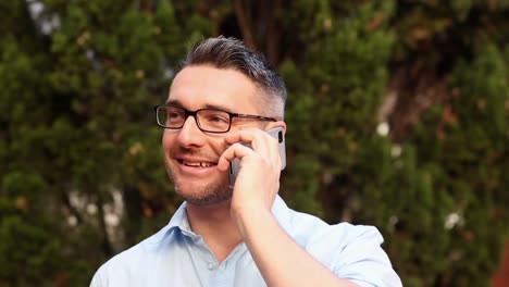 happy lecturer answering his phone