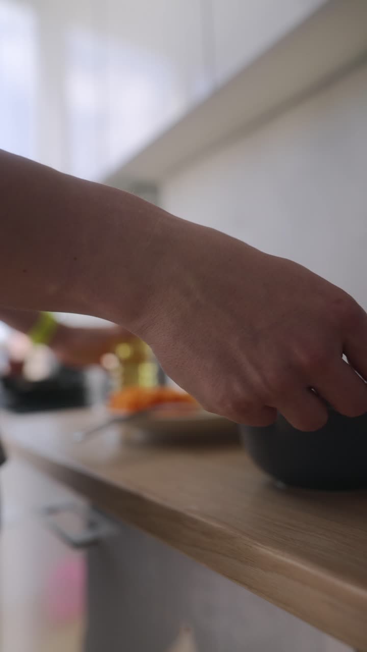 Preparing a meal in a modern kitchen