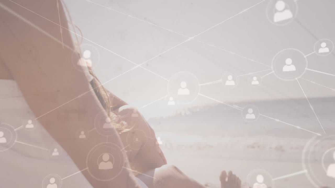 Walking on beach, person surrounded by animated network of connections in air