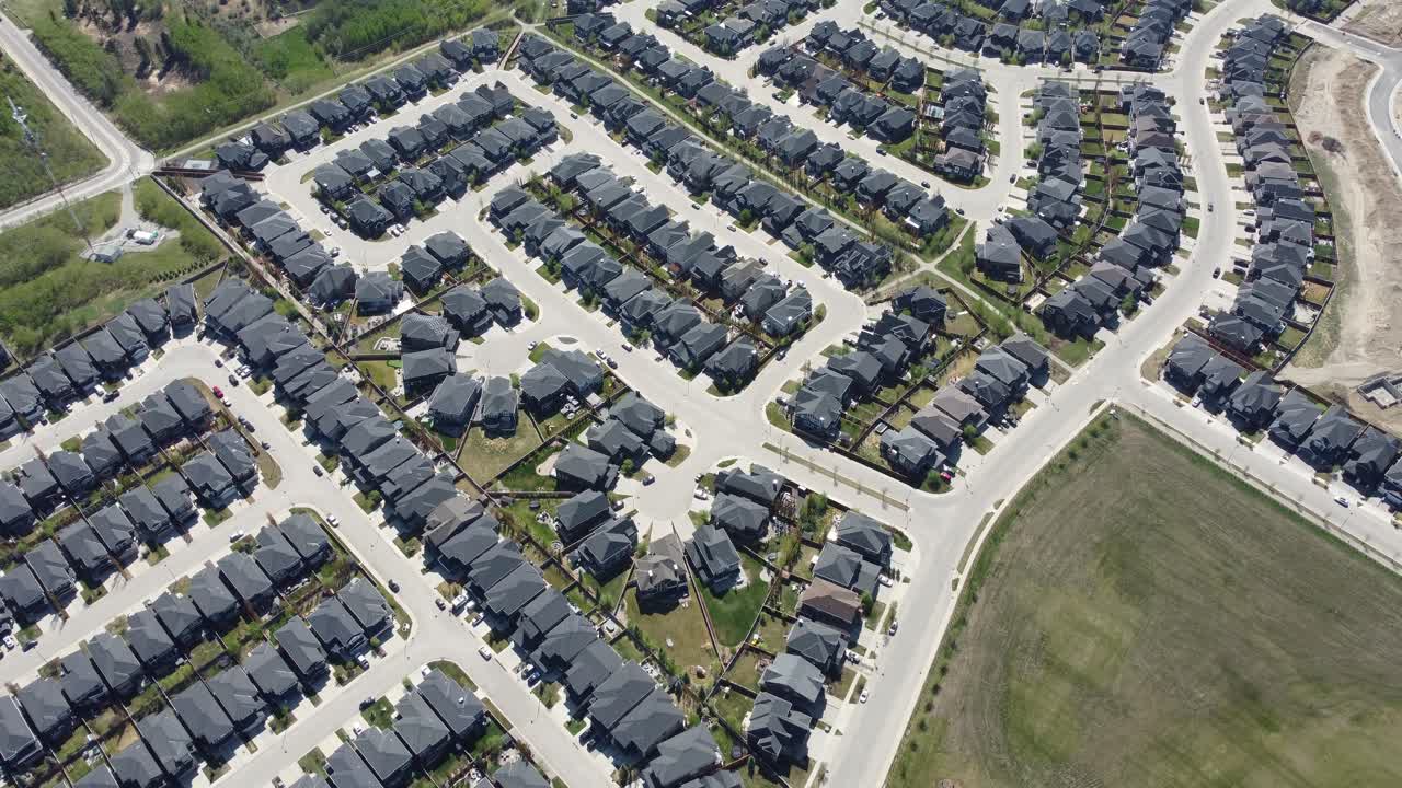Aerial view of a suburban neighbourhood in Calgary, Alberta in summer.