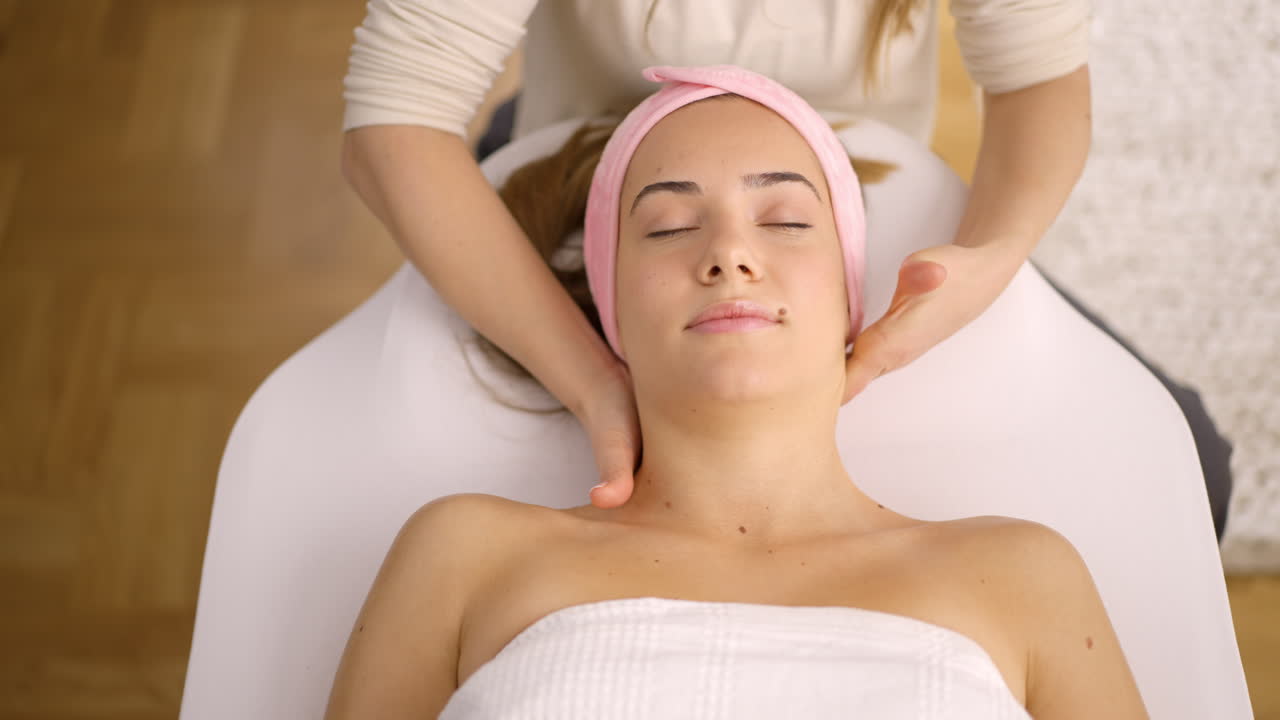 Woman receiving a relaxing spa massage