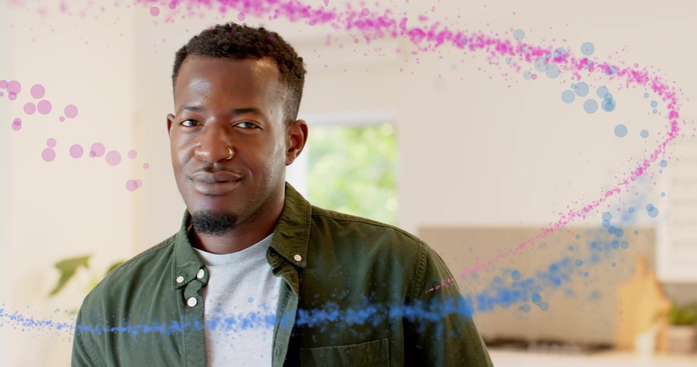 Scene opening releasing swirling pink blue particles around mid adult man illustrating technology