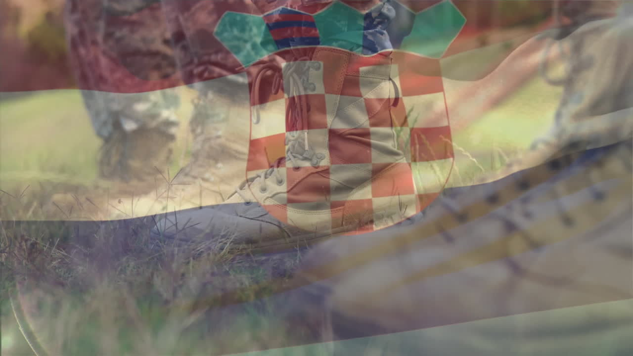 Croatian flag animation overlaying hikers walking on grassy trail outdoors