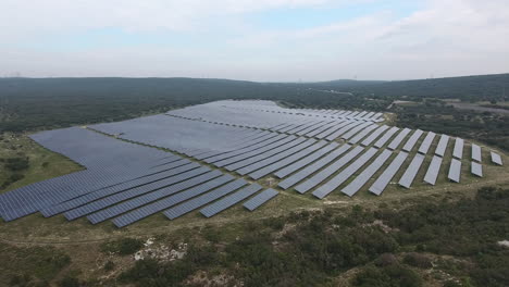 aerial view of a photovoltaic power station in france. cloudy day