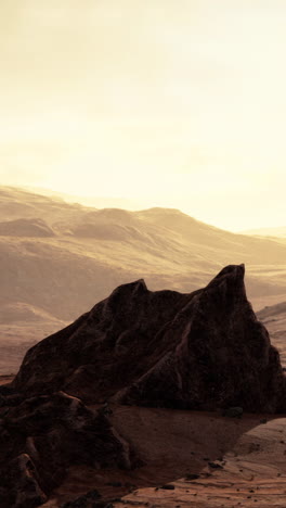 sunset over a rocky desert landscape