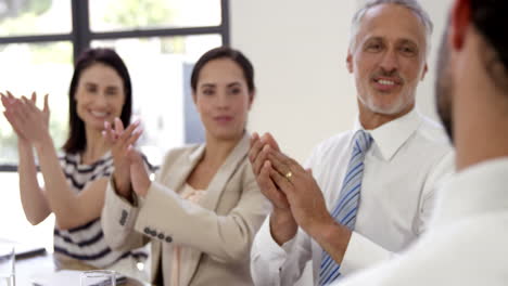 business people applauding together