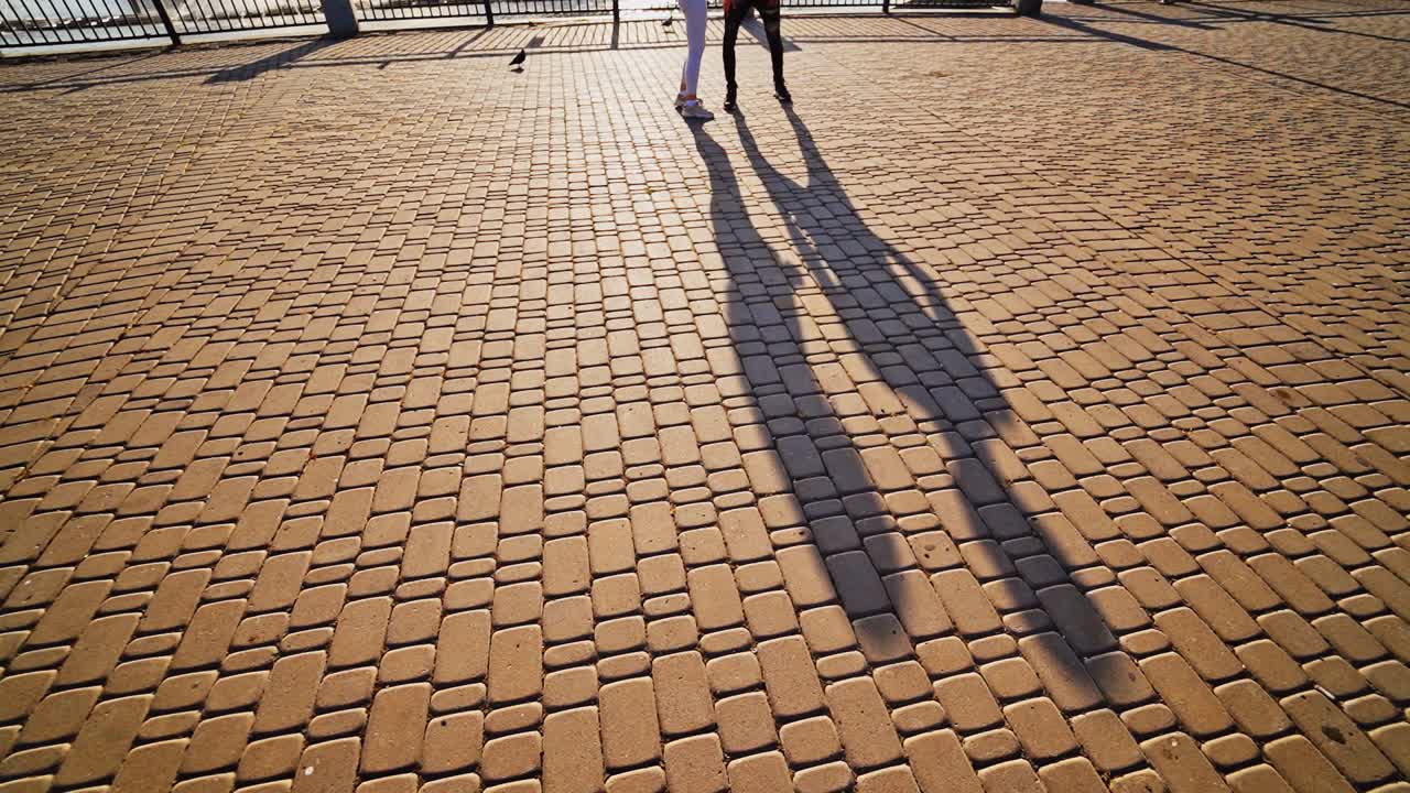 Couple in love having fun in city. Sweet couple having fun and dancing together outdoors