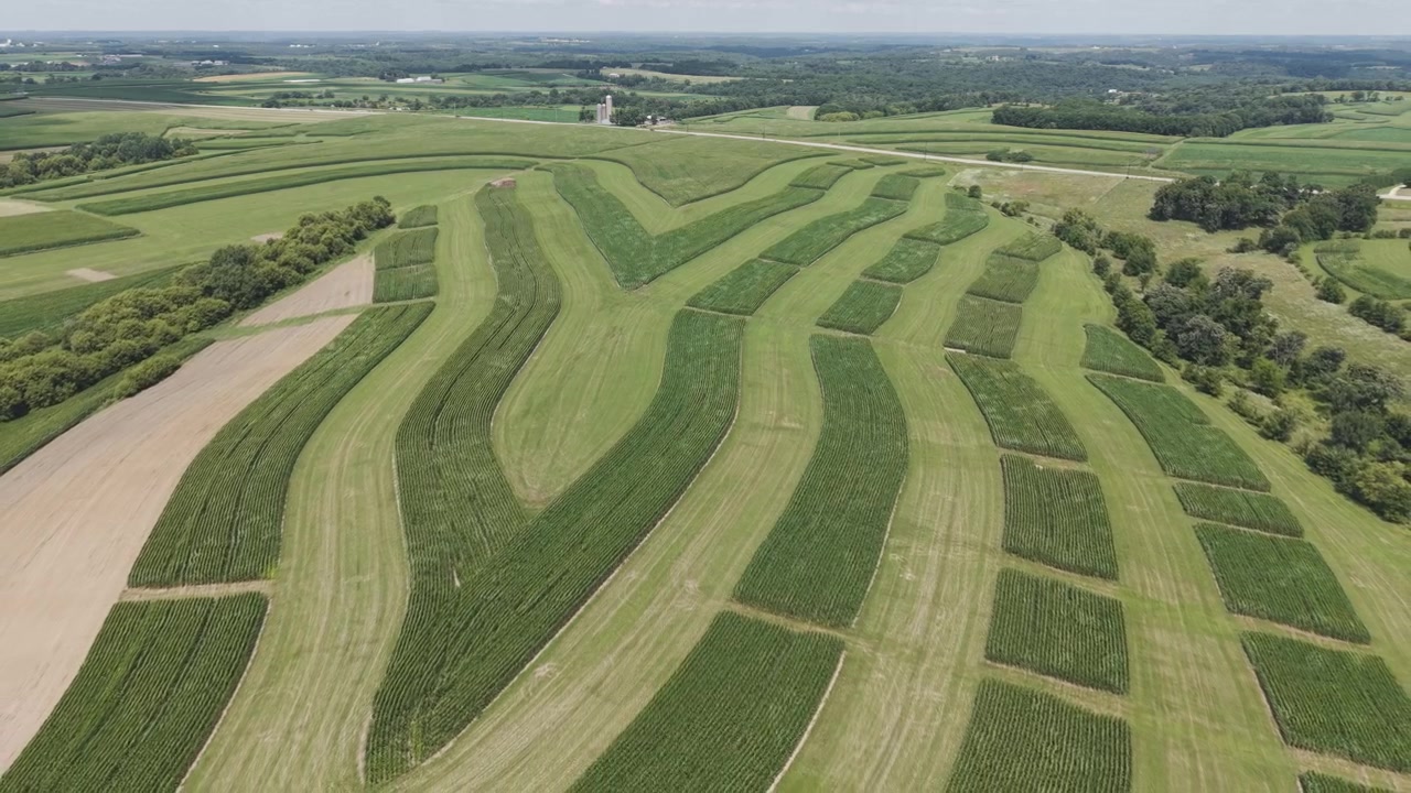 Contour Farming is a conservation practice that involves planting across a field’s slope, close to the contour as possible. This includes tilling and cultivation. Contour farming reduces soil erosion.