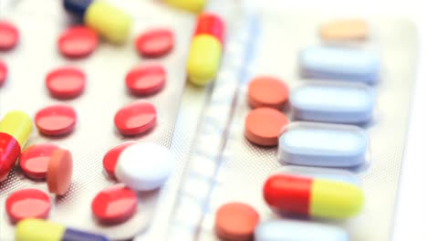 Several-medicine-tablets-and-pills-rotating-