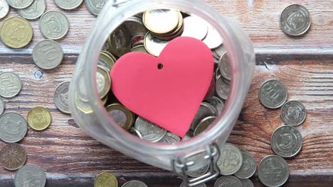 donation jar with red heart