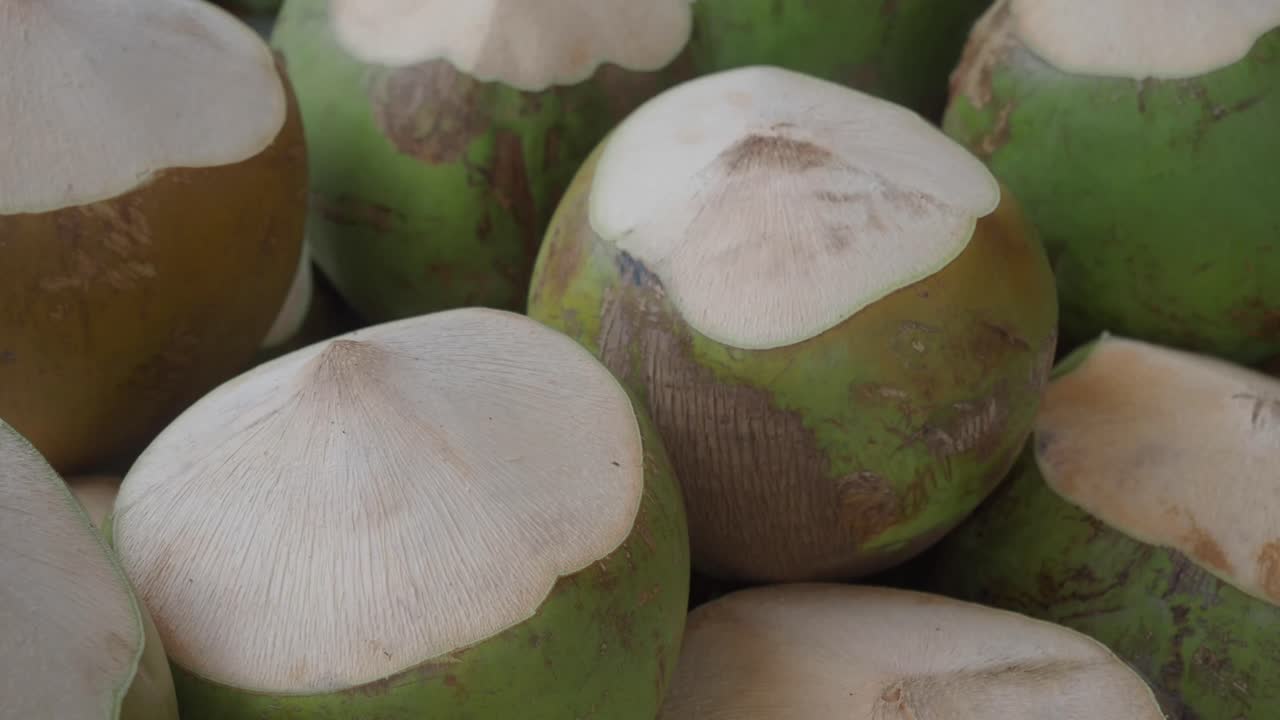Pile of Fresh Green Coconuts