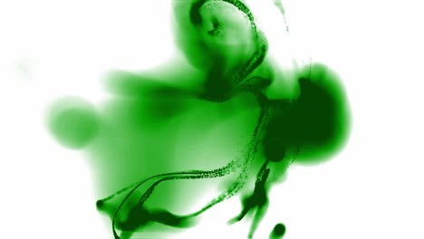 Green-ink-or-other-fluid-cloud-spreading-on-white-surface