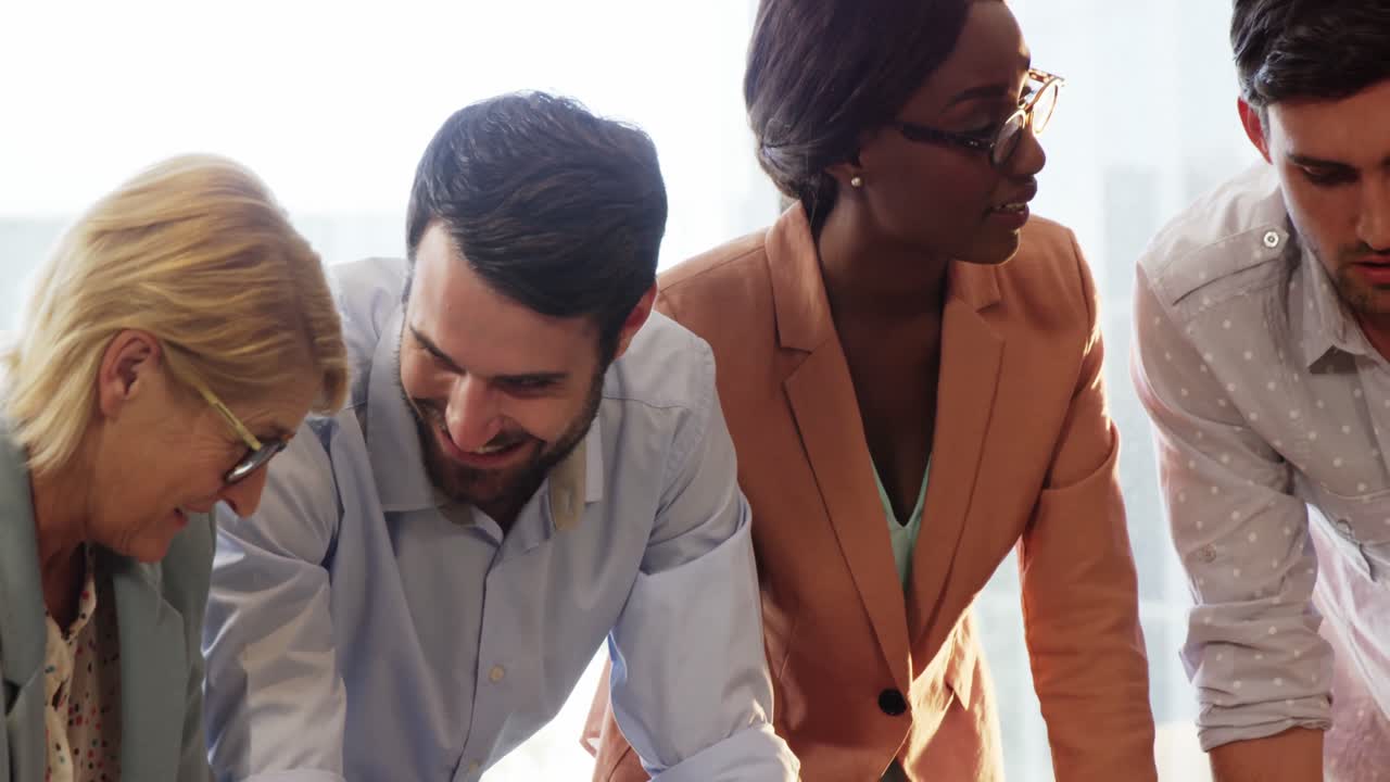 Businesspeople interacting with each other