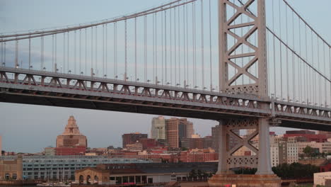 establishing shot of philadelphia's ben franklin bridge. shot at sunrise in pennsylvania