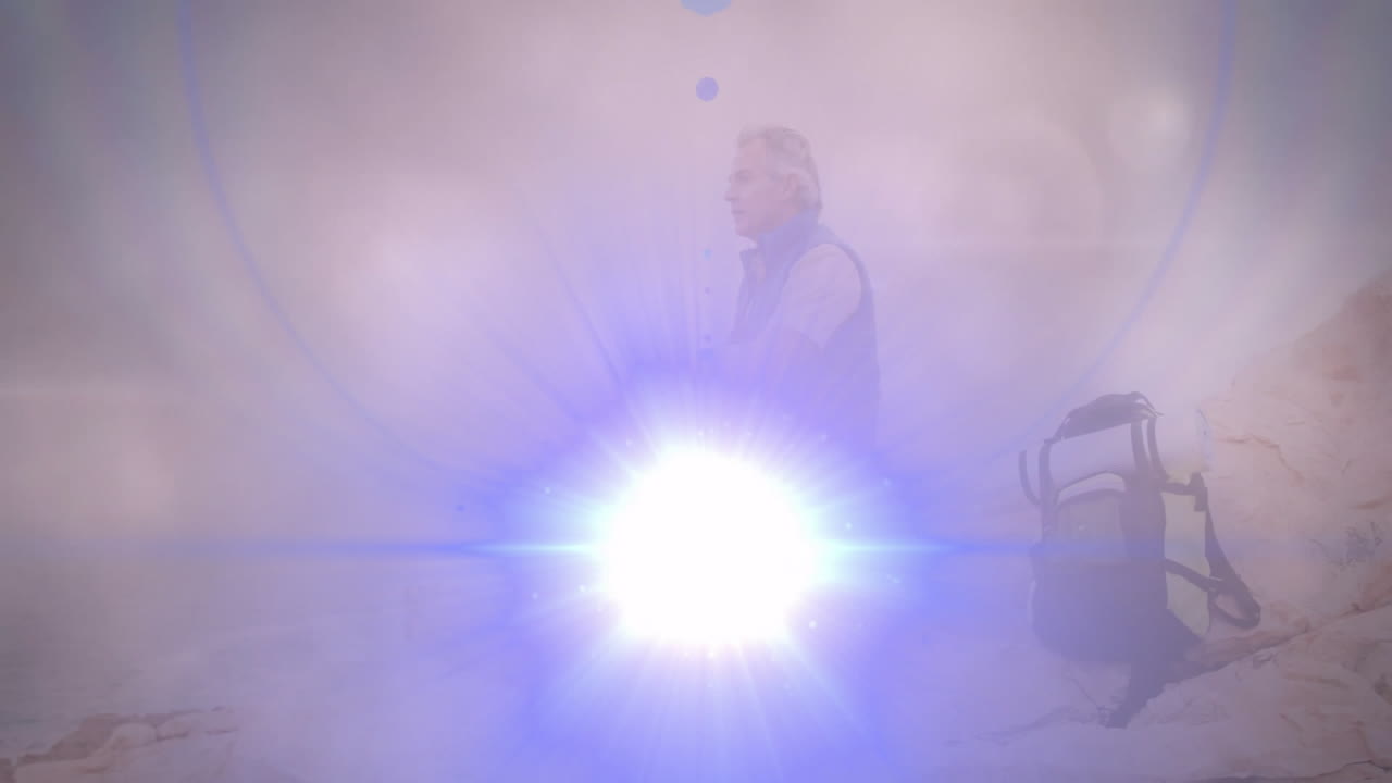 Senior hiker gripping trekking pole on rocky coast, showcasing travel data with floating route line