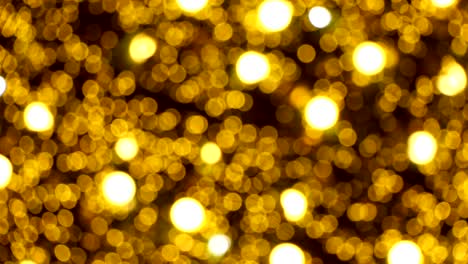 abstract background yellow bokeh light from the christmas tree.lights would suit a christmas theme