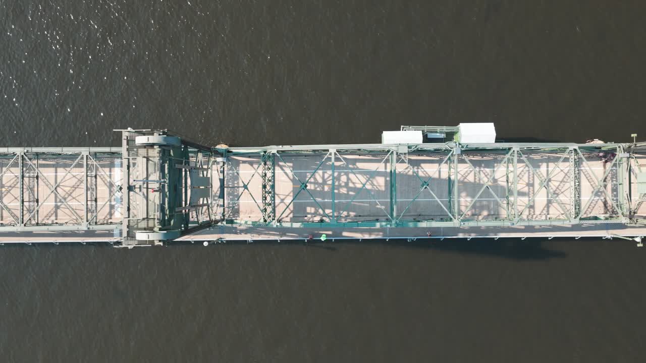 Bird's eye aerial dolly shot of the St. Croix River Lift Bridge in Stillwater, Minnesota. 4K