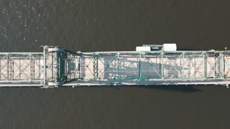 bird's eye aerial dolly shot of the st. croix river lift bridge in stillwater, minnesota. 4k