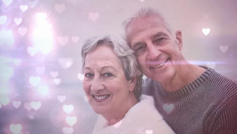 Happy-couple-smiling-at-the-camera