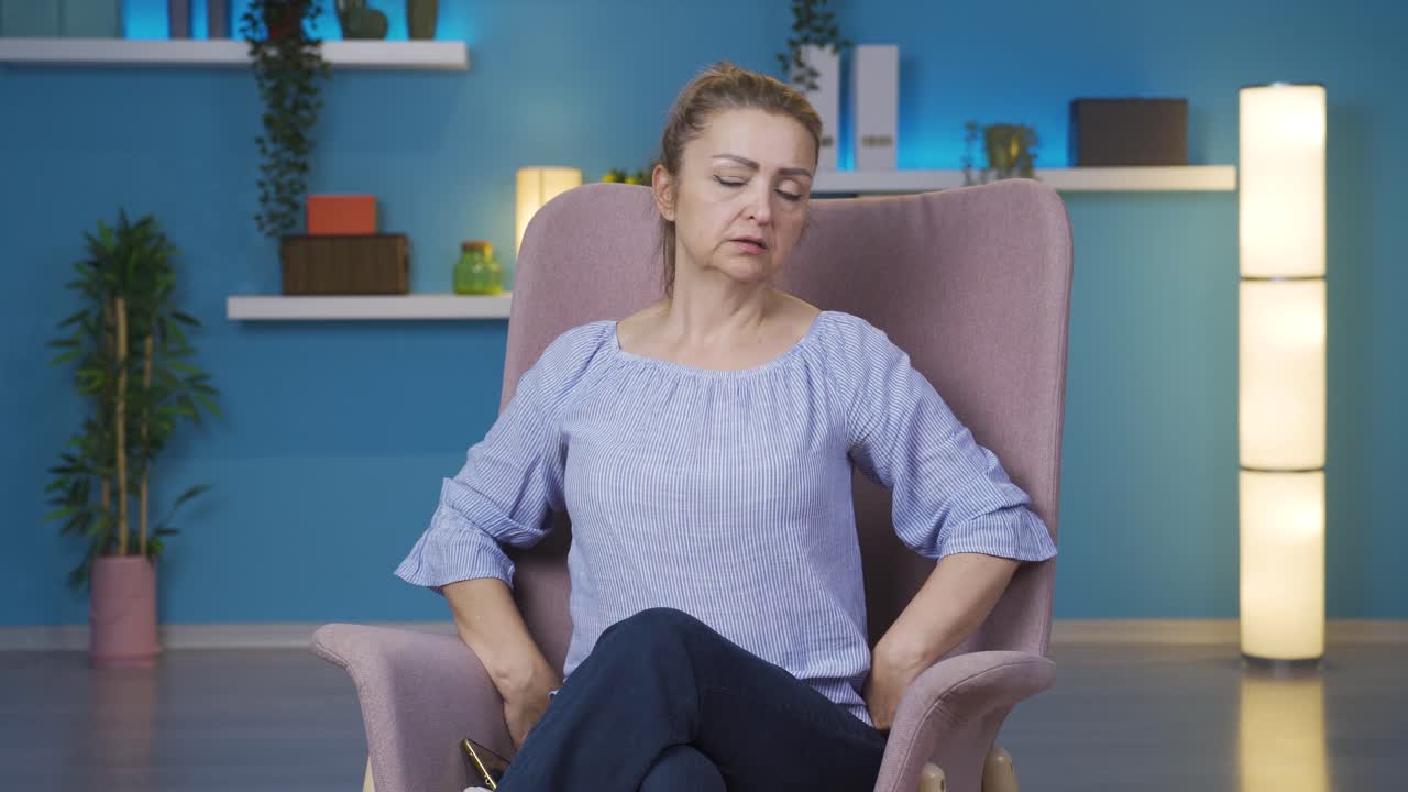 The woman who doesn't feel well.