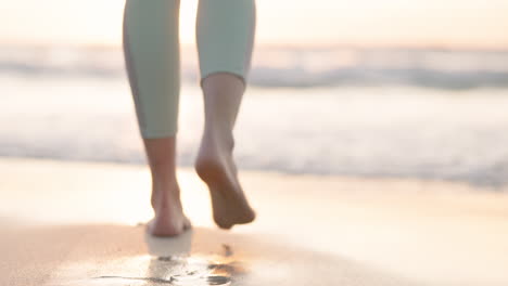 beach, sunset and legs of person walking