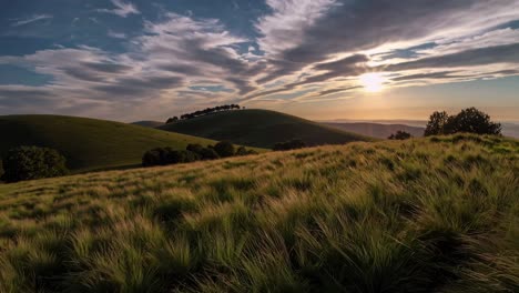 aerial video of rolling green hills under a vibrant sky, showcasing a sweeping landscape