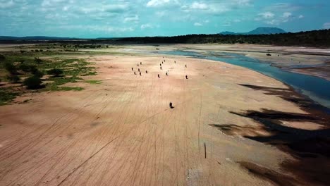 Group-Of-Riders-On-Their-Off-Road-Adventure-Around-Lake-Magadi-In-Kenya,-East-Africa