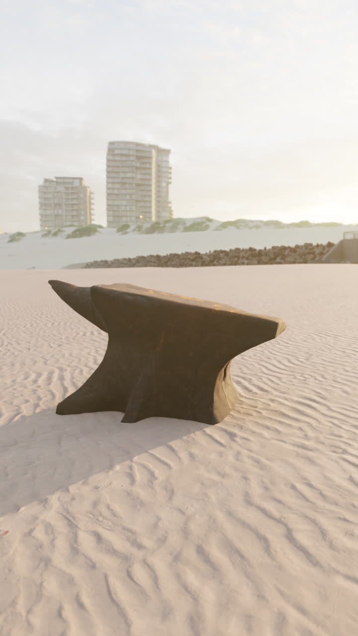 Anvil on a beach at sunset