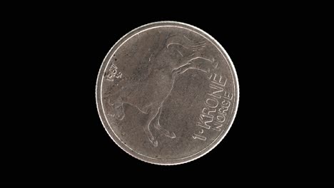 norway 1967 1 krone coin reverse with horse facing left and denomination rotating on black background