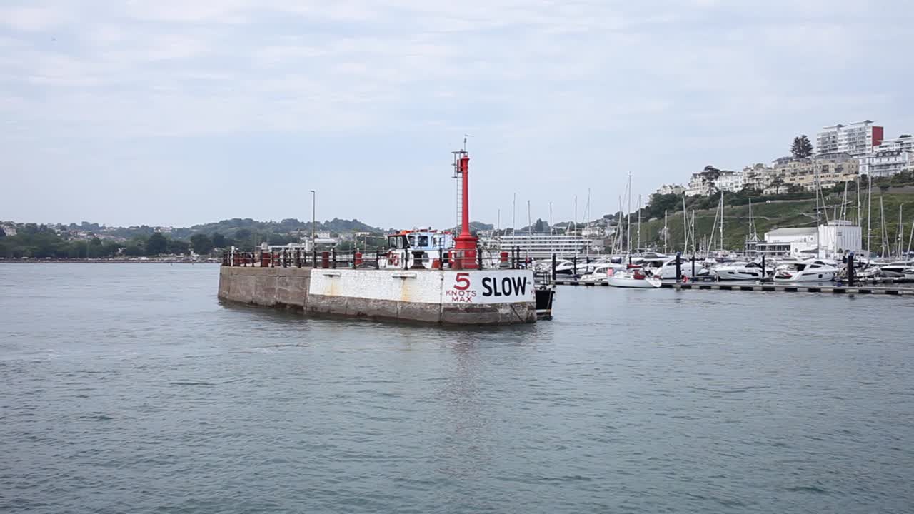 Entrance to harbour at Torquay, Devon. England. UK. Summer. 2025